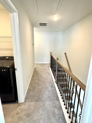 a view of a room with racks on the wall