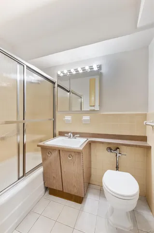 a picture of a book and a white bed