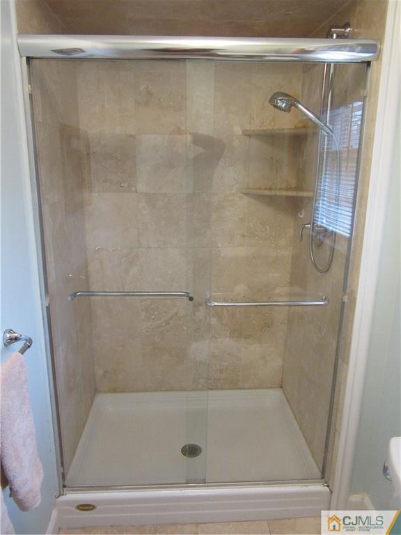 63 Royce Brook Road Hillsborough, NJ 08844 - Photo 13 of 25 a bathroom with a shower
