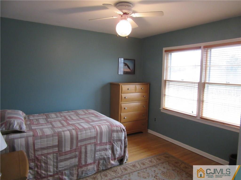 63 Royce Brook Road Hillsborough, NJ 08844 - Photo 15 of 25 a bedroom with a bed and a window