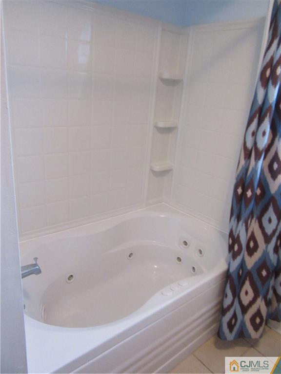 63 Royce Brook Road Hillsborough, NJ 08844 - Photo 19 of 25 a bathroom with bathtub and shower