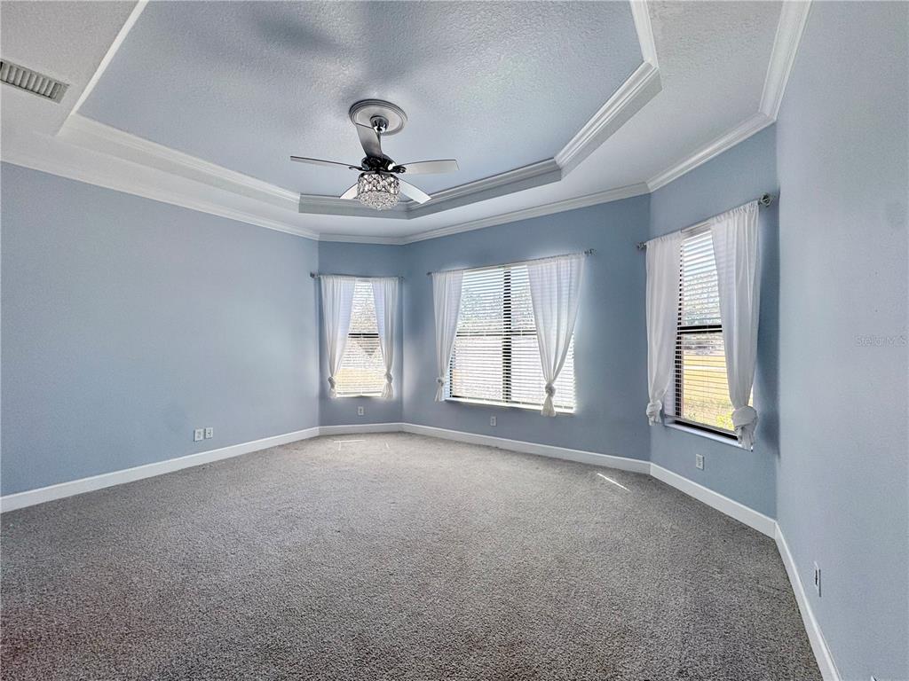 12822 Del Corso Loop Bradenton, FL 34211 - Photo 15 of 58 a view of an empty room with a window