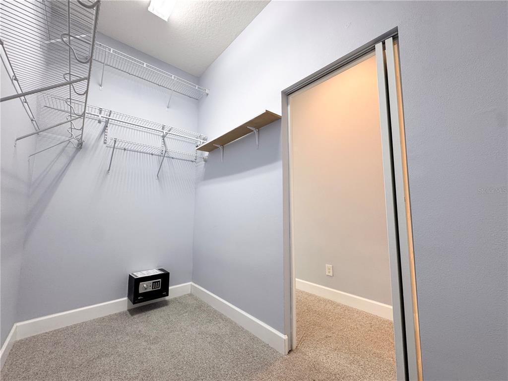 12822 Del Corso Loop Bradenton, FL 34211 - Photo 17 of 58 a view of a room with shelf