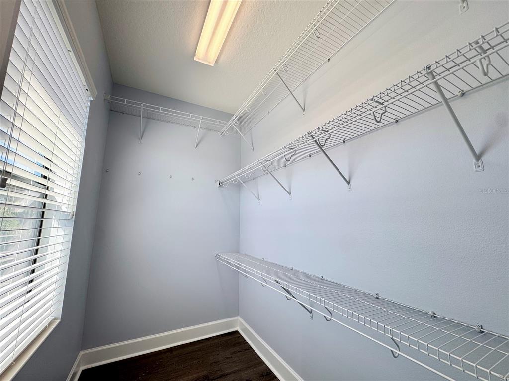 12822 Del Corso Loop Bradenton, FL 34211 - Photo 43 of 58 a view of a room with racks on the wall