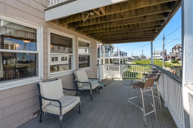 a view of a chairs and table in a patio