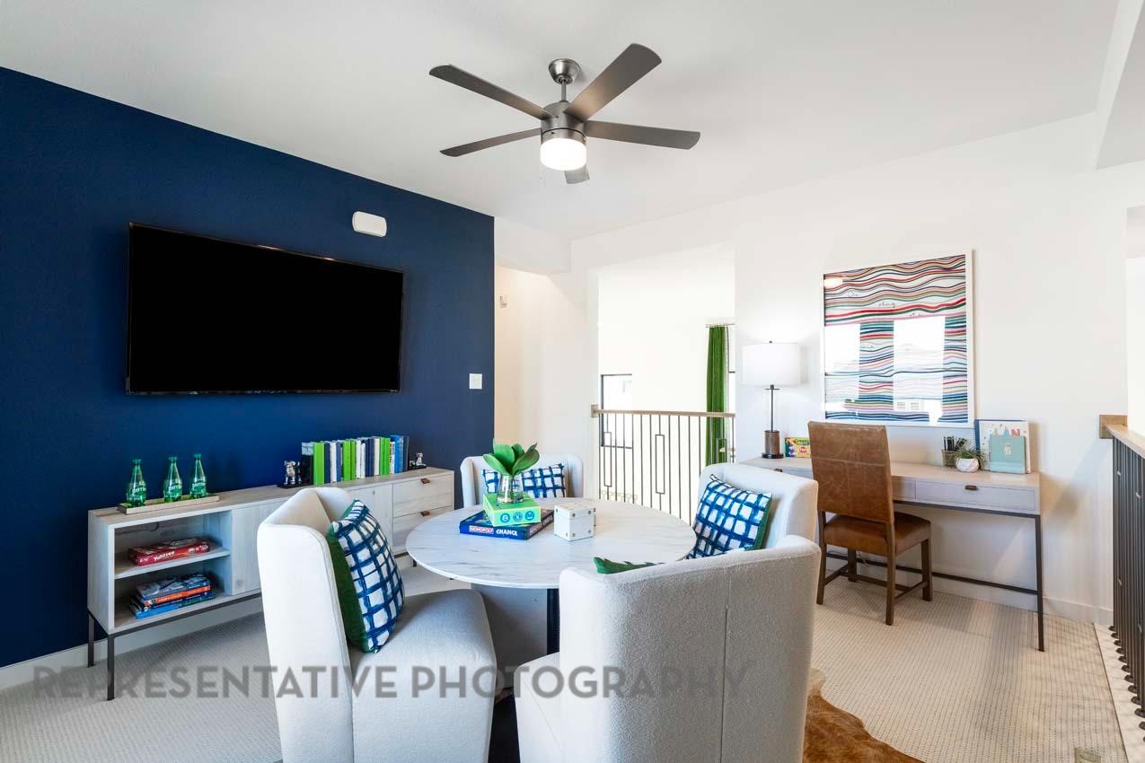 5411 Bonfire Alley Manvel, TX 77578 - Photo 15 of 21 a living room with furniture and a flat screen tv