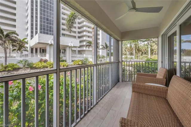 a view of a porch with wooden floor and outdoor space