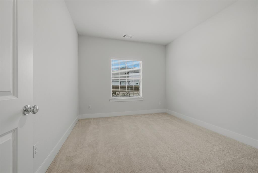 1346 Chisos Way Forney, TX 75126 - Photo 23 of 40 a view of an empty room with a window