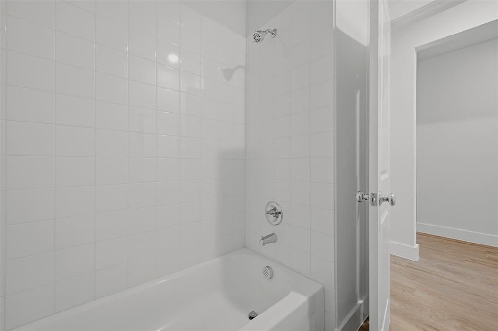 1346 Chisos Way Forney, TX 75126 - Photo 25 of 40 a bathroom with a bathtub