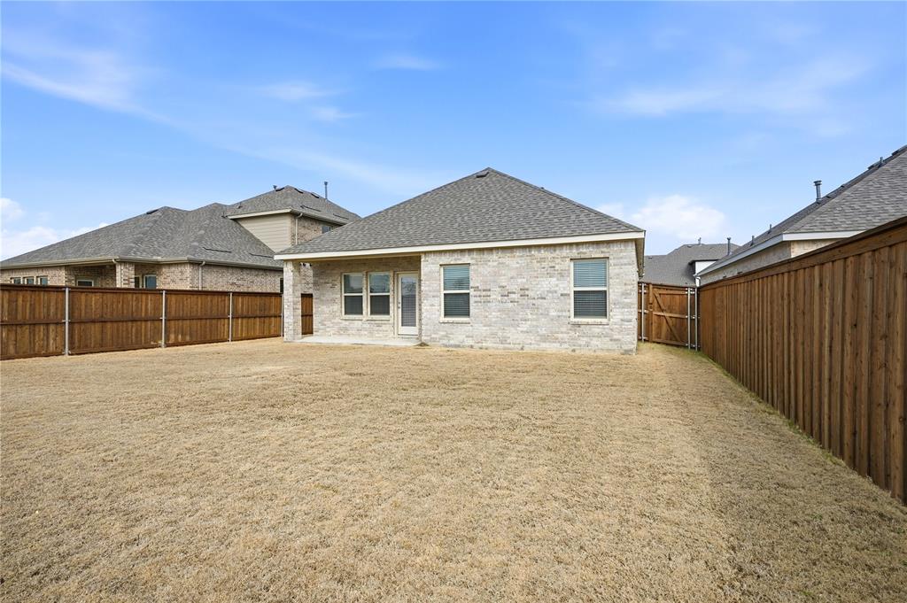 1346 Chisos Way Forney, TX 75126 - Photo 30 of 40 a front view of a house with a yard