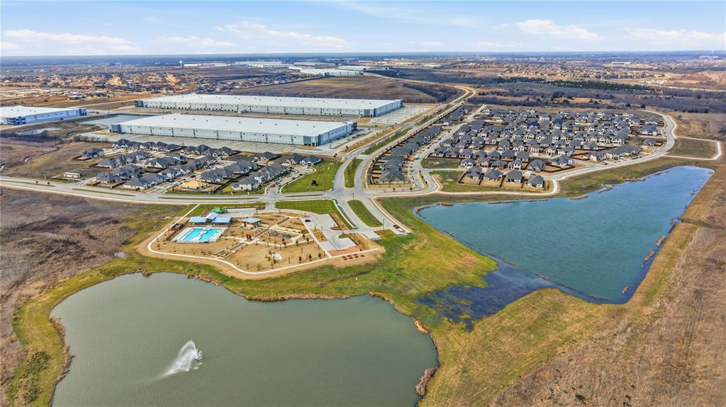 1346 Chisos Way Forney, TX 75126 - Photo 39 of 40 a view of a swimming pool with a lake