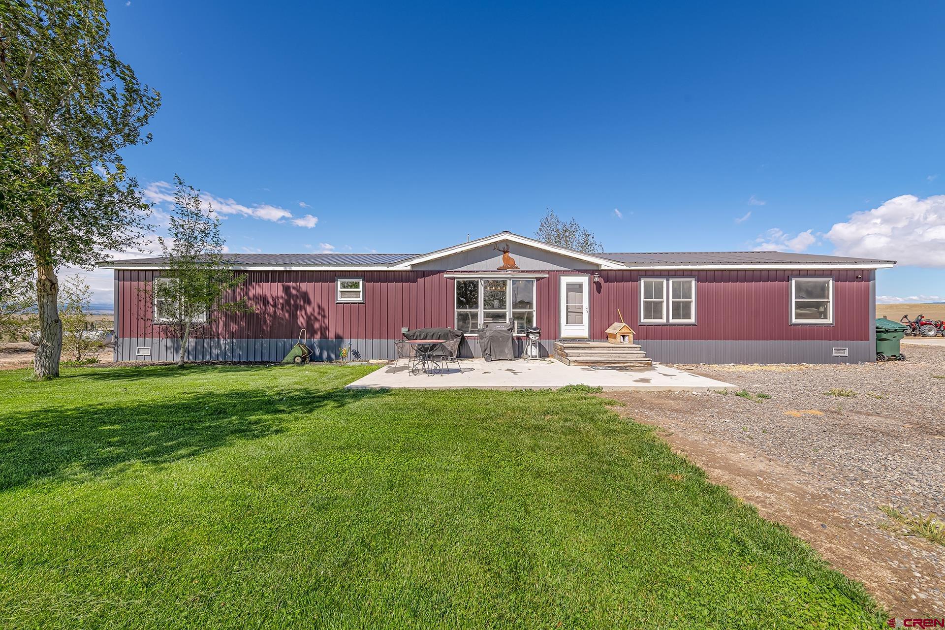 2787 2100th Road Delta, CO 81416 - Photo 1 of 40 a view of a house with a yard