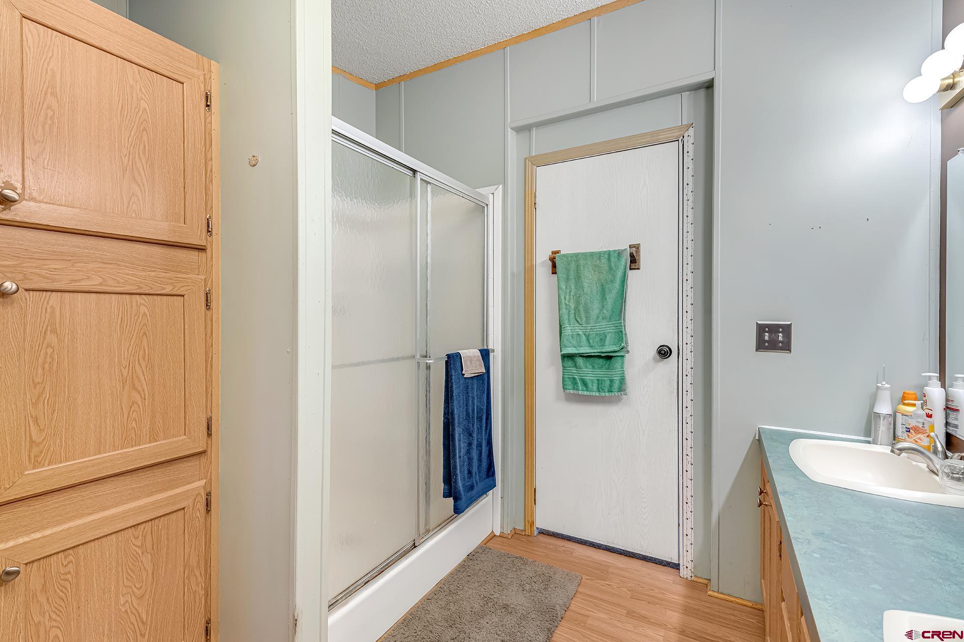 2787 2100th Road Delta, CO 81416 - Photo 21 of 40 a view of a bathroom from the hallway