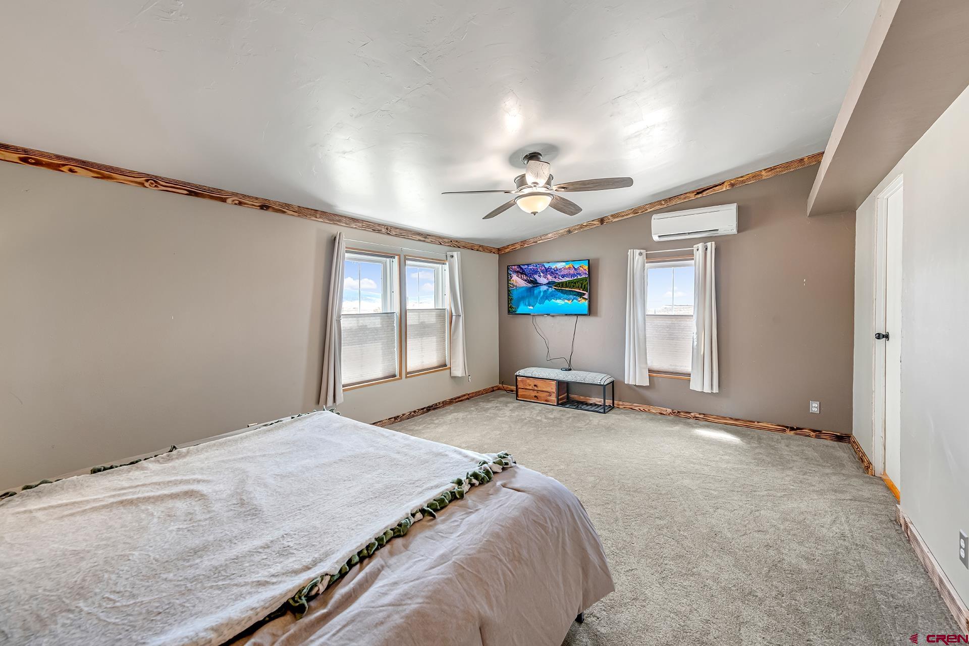 2787 2100th Road Delta, CO 81416 - Photo 28 of 40 a bed room with a bed and a window