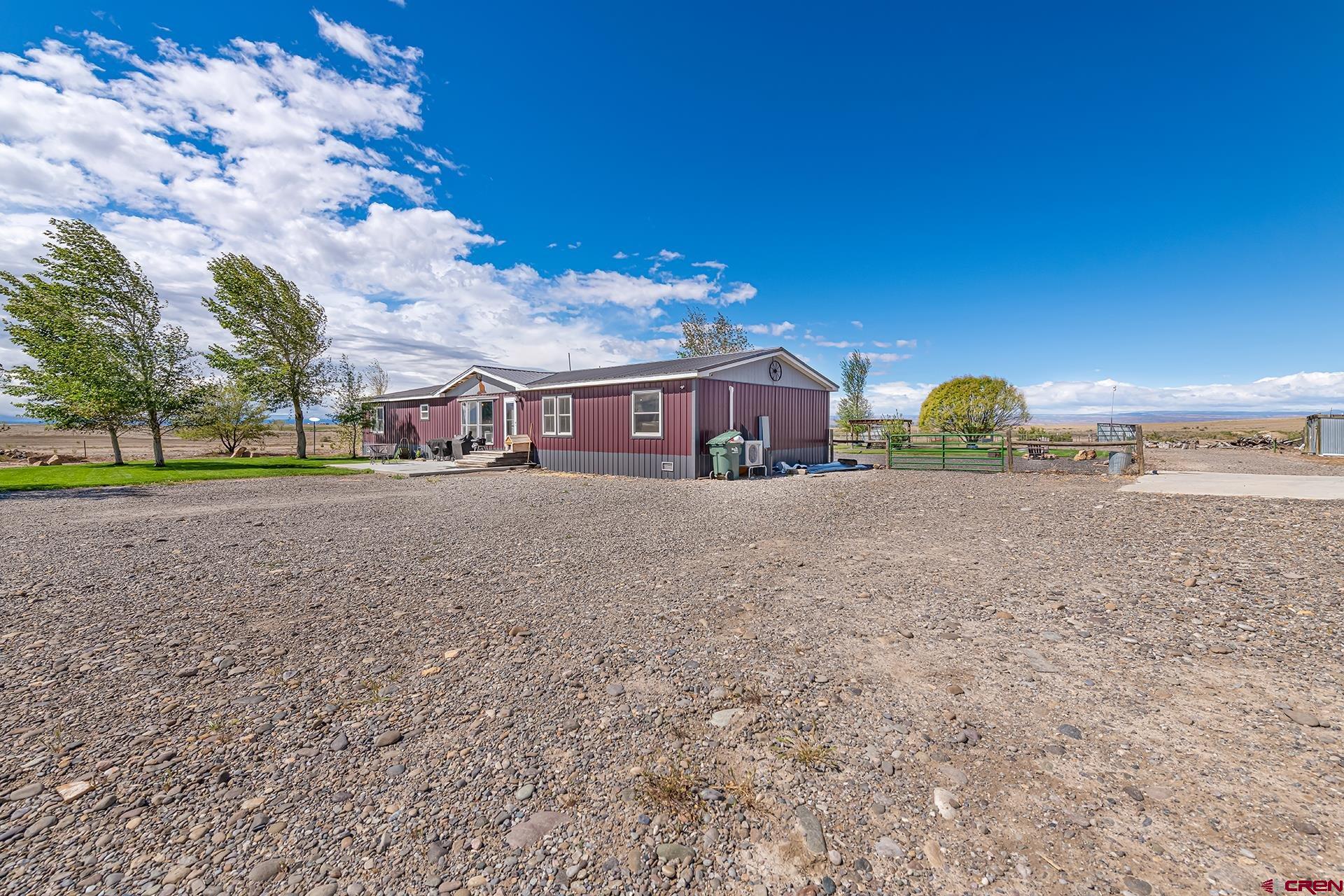 2787 2100th Road Delta, CO 81416 - Photo 3 of 40 a view of street with houses