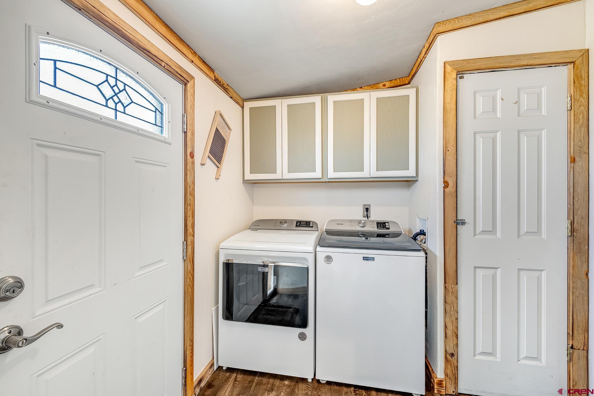 2787 2100th Road Delta, CO 81416 - Photo 32 of 40 a kitchen with a stove and a refrigerator