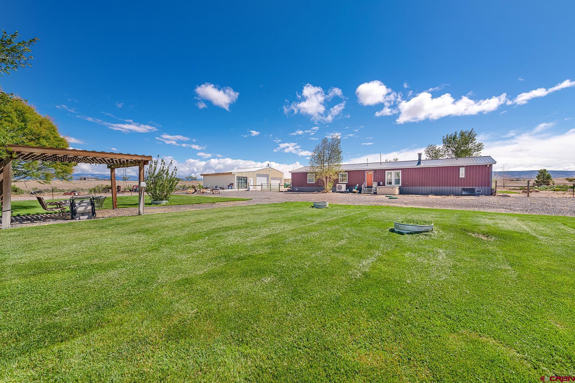 2787 2100th Road Delta, CO 81416 - Photo 33 of 40 a view of a house with a big yard