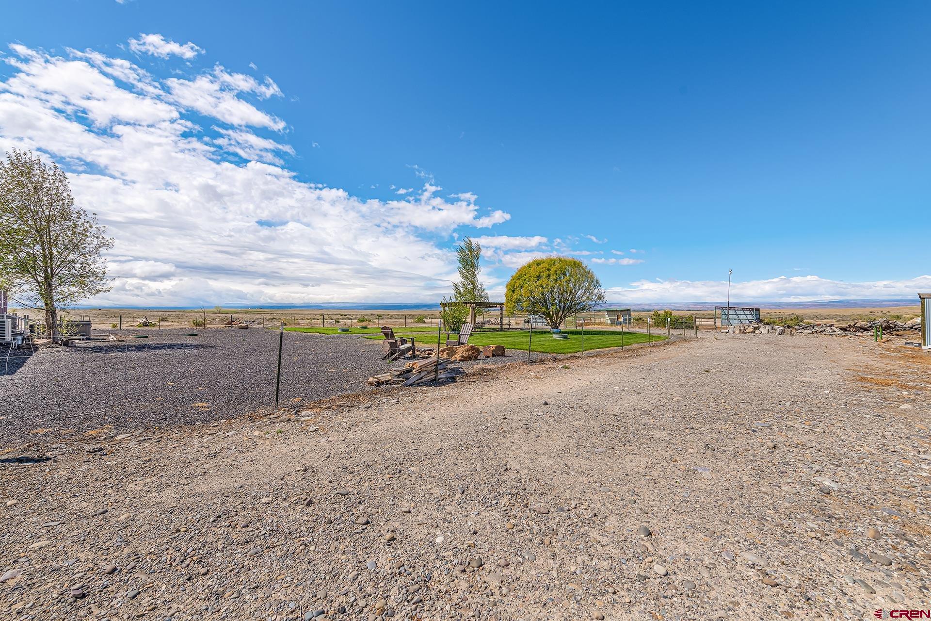 2787 2100th Road Delta, CO 81416 - Photo 39 of 40 a view of a road with a yard