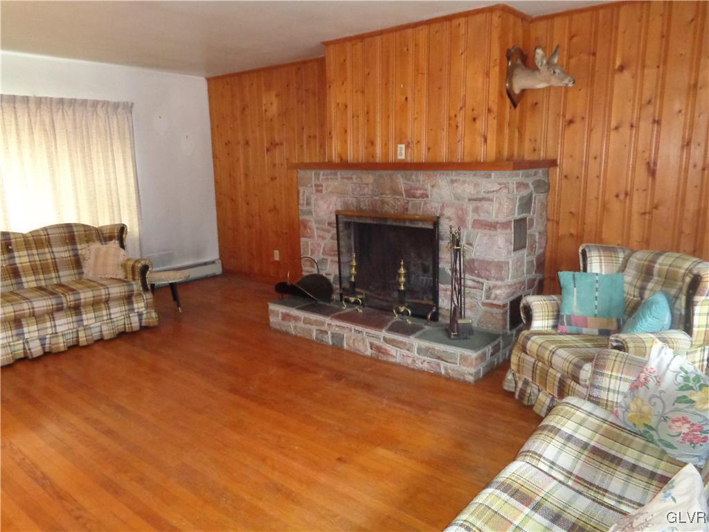 8367 Rextown Road Slatington, PA 18080 - Photo 4 of 21 a living room with furniture and a fireplace