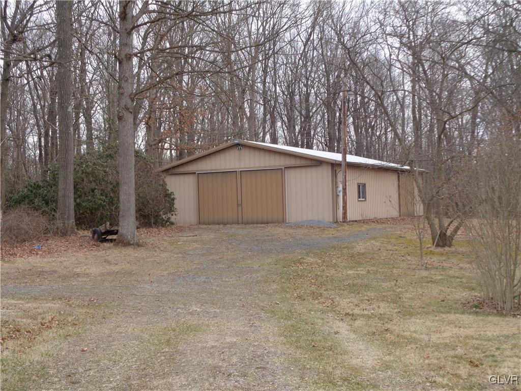 8367 Rextown Road Slatington, PA 18080 - Photo 9 of 21 a house with trees in front of it