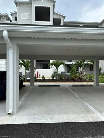 a kitchen with a sink and a stove top oven
