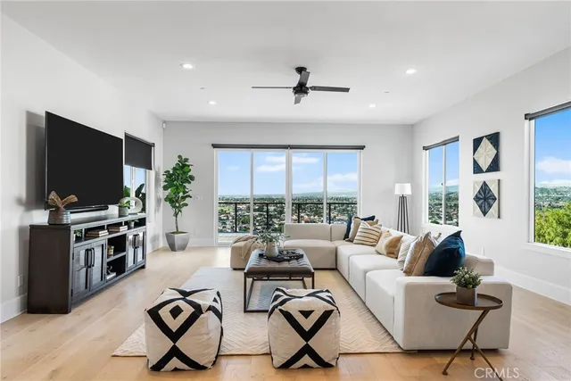 a spacious bathroom with a double vanity sink mirror and bathtub