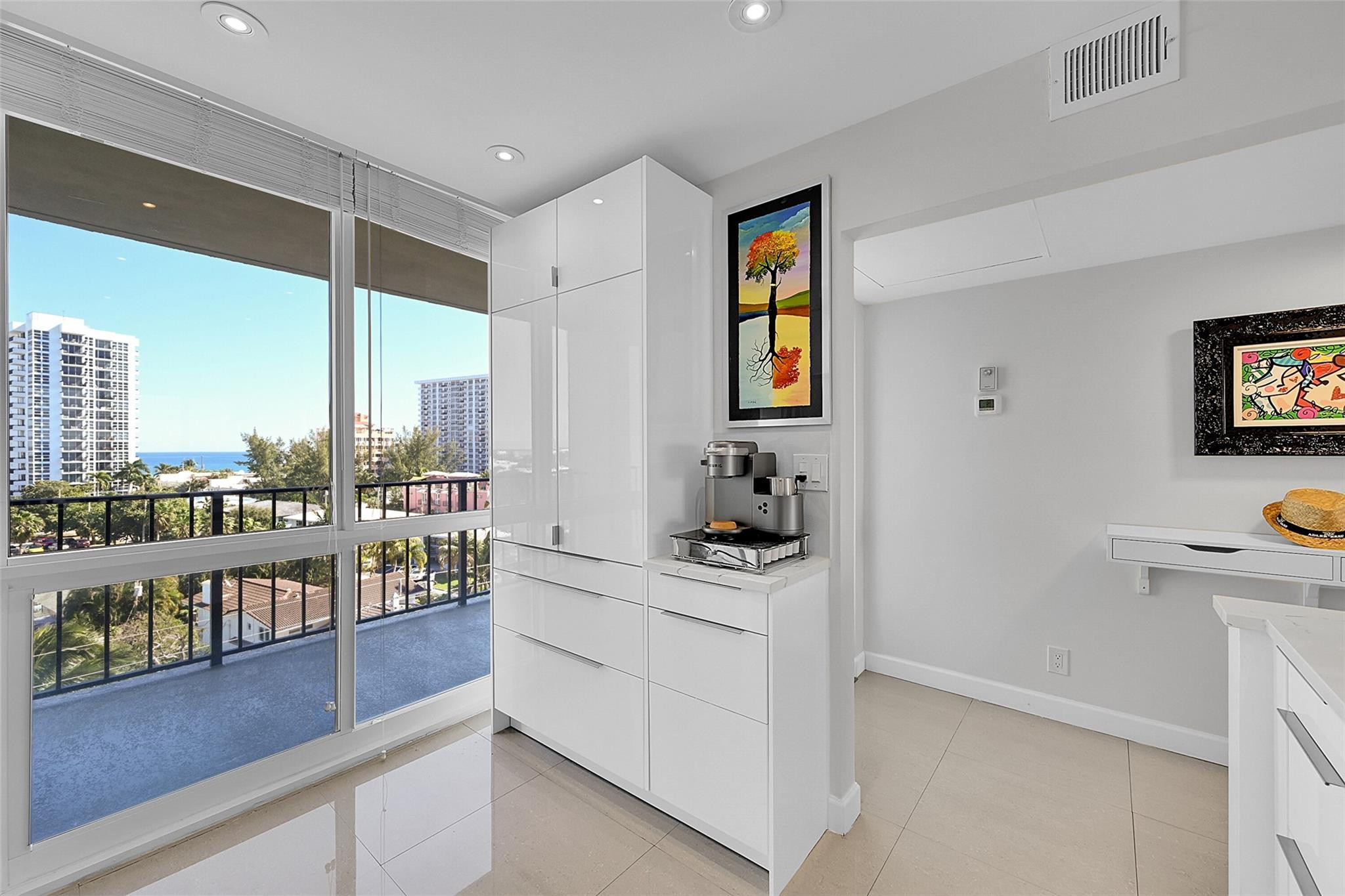 521 North Riverside Drive, Unit 707 Pompano Beach, FL 33062 - Photo 7 of 55 Kitchen pantry