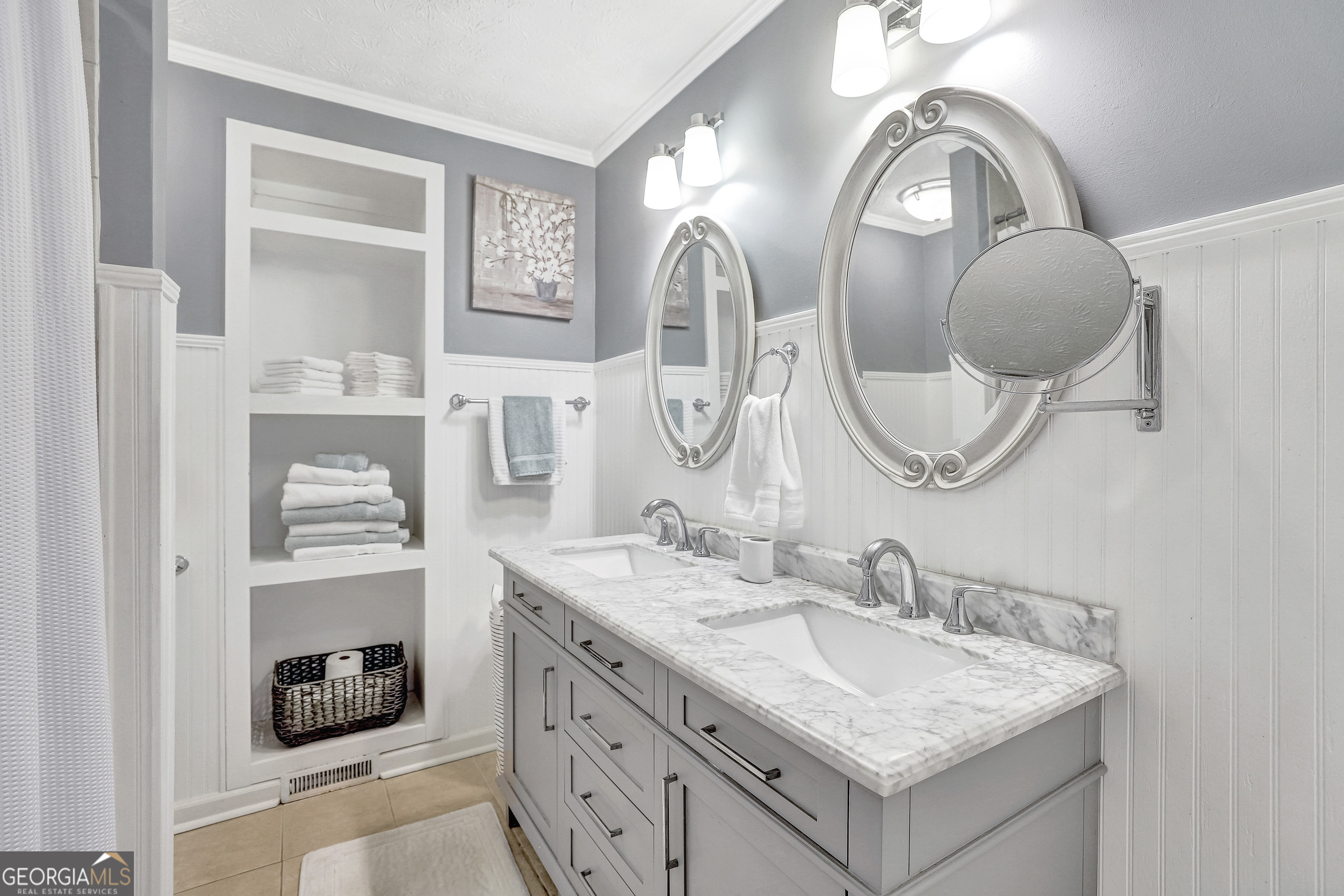 300 Briarwood Road Tyrone, GA 30290 - Photo 26 of 74 a bathroom with a granite countertop double vanity sink and a mirror
