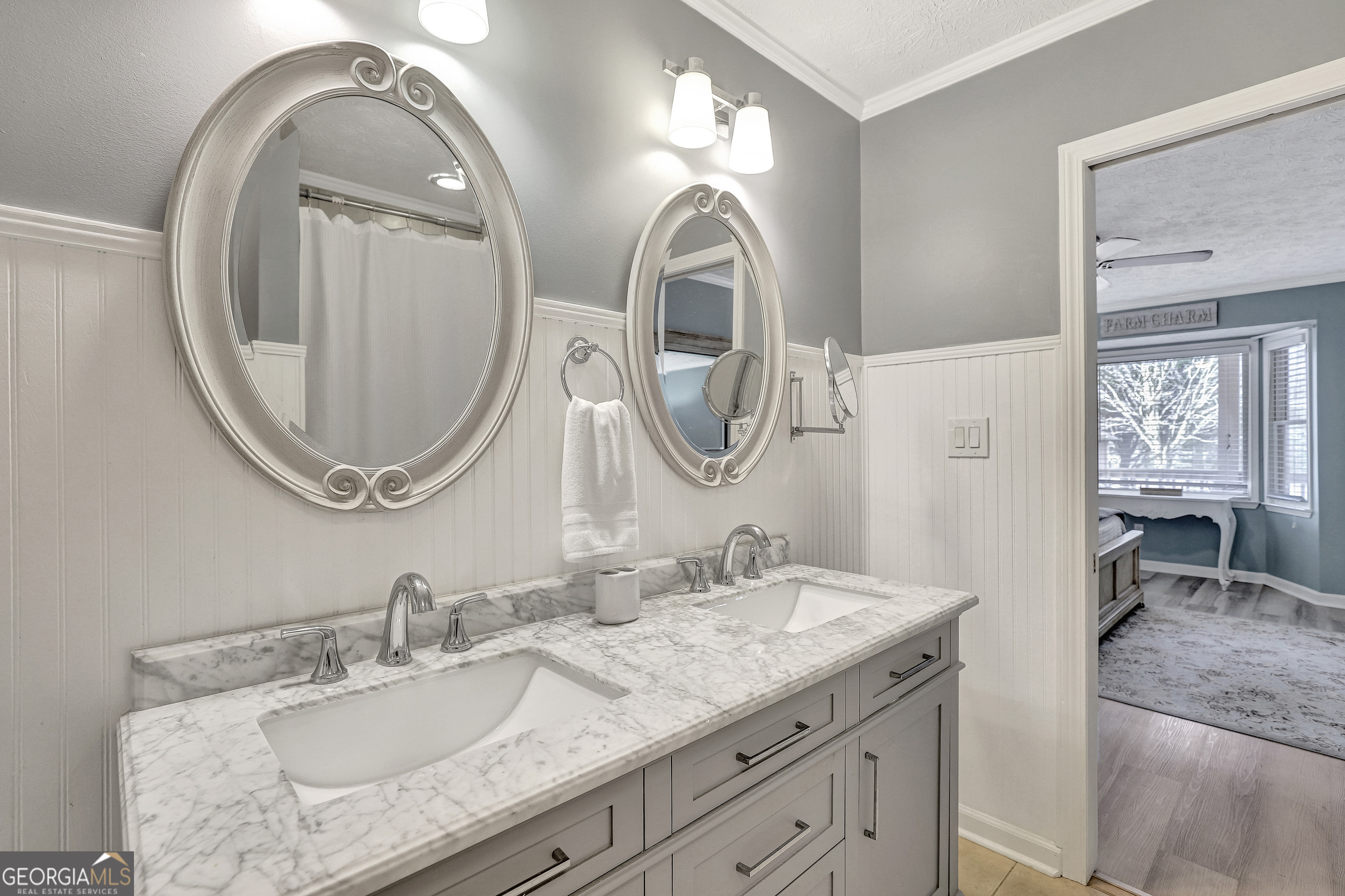 300 Briarwood Road Tyrone, GA 30290 - Photo 27 of 74 a bathroom with a granite countertop double vanity sinks and a mirror