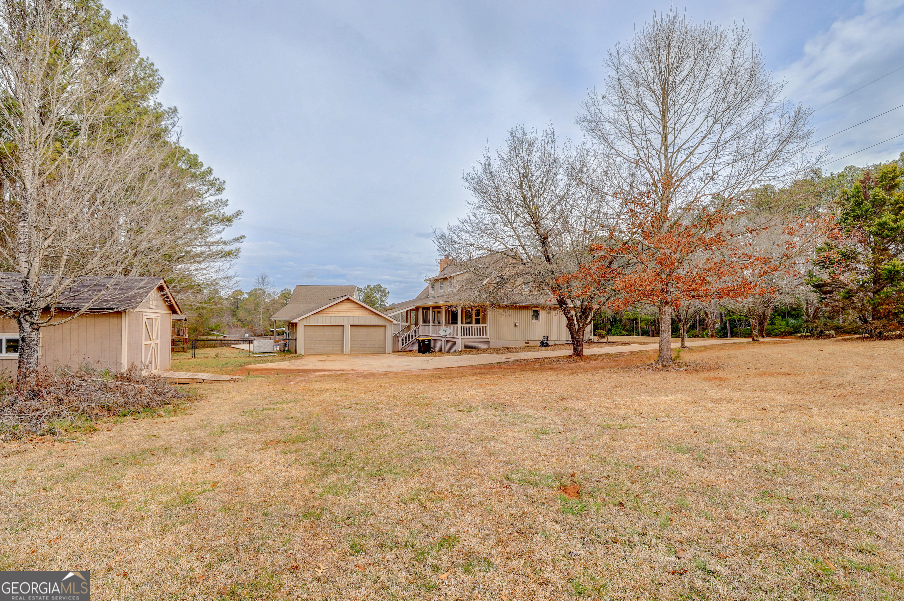 300 Briarwood Road Tyrone, GA 30290 - Photo 72 of 74 a view of large yard with a house