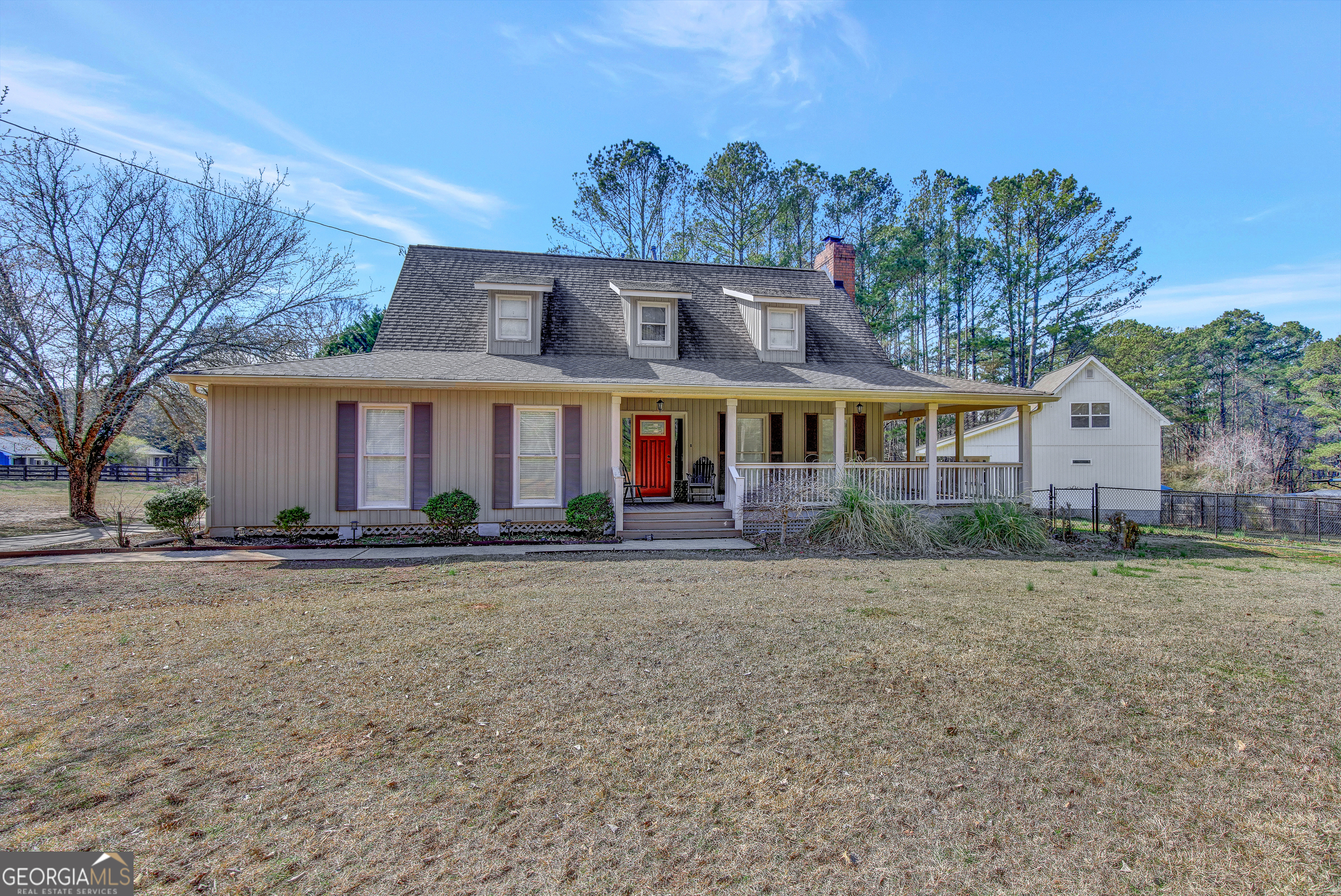 300 Briarwood Road Tyrone, GA 30290 - Photo 74 of 74 front view of a house with a yard