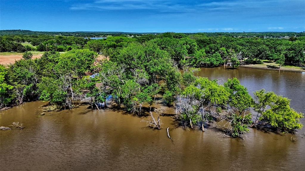 Tbd Selma Road Bowie, TX 76230 - Photo 6 of 18 a view of a lake with outdoor space