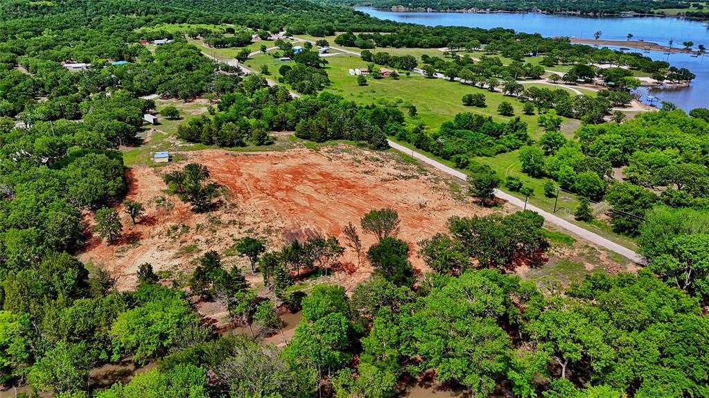 Tbd Selma Road Bowie, TX 76230 - Photo 8 of 18 an aerial view of residential house with outdoor space and trees all around