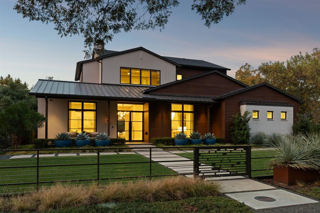 4447 Taos Road Dallas, TX 75209 - Photo 36 of 38 a front view of a house with a yard