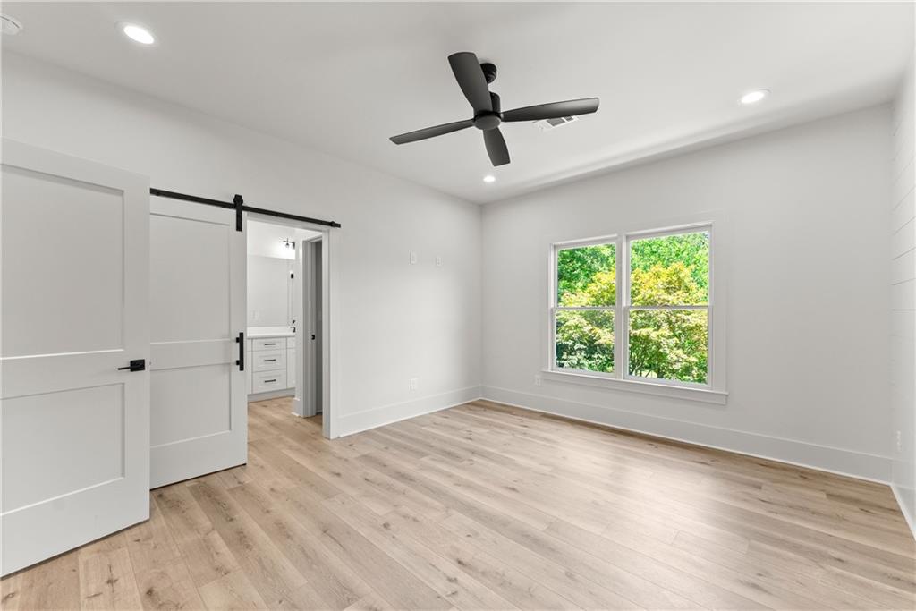 372 Forrest Avenue Gainesville, GA 30501 - Photo 21 of 29 an empty room with windows and closet
