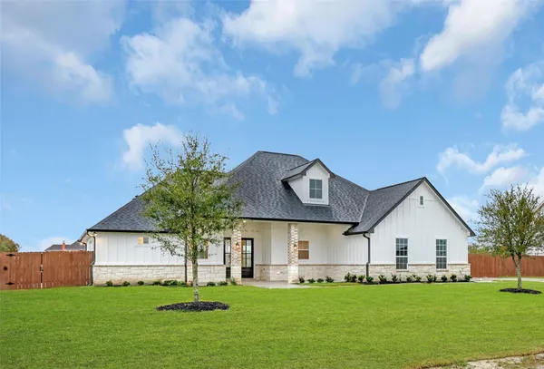 a front view of house with yard