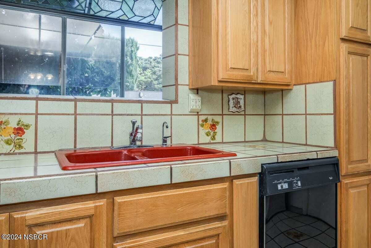 715 South Bradley Road, Unit 25 Santa Maria, CA 93454 - Photo 11 of 28 a kitchen with a sink and cabinets