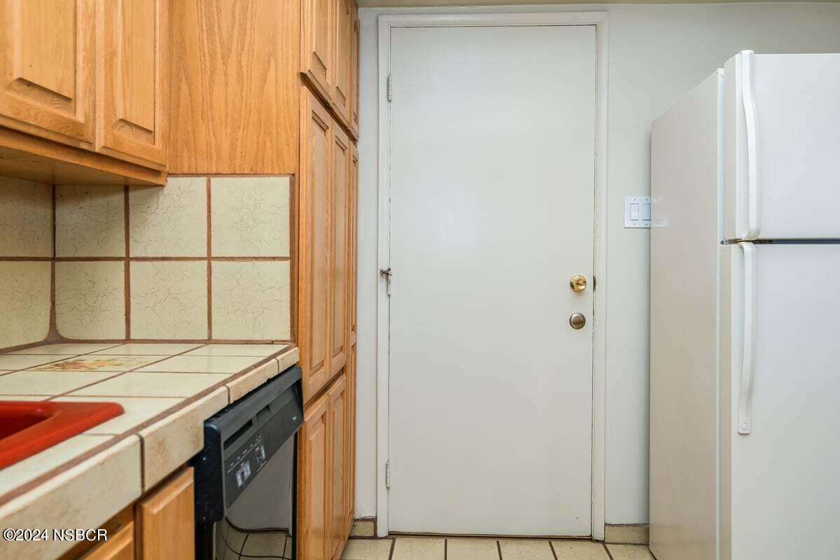 715 South Bradley Road, Unit 25 Santa Maria, CA 93454 - Photo 12 of 28 a view of a kitchen with a sink