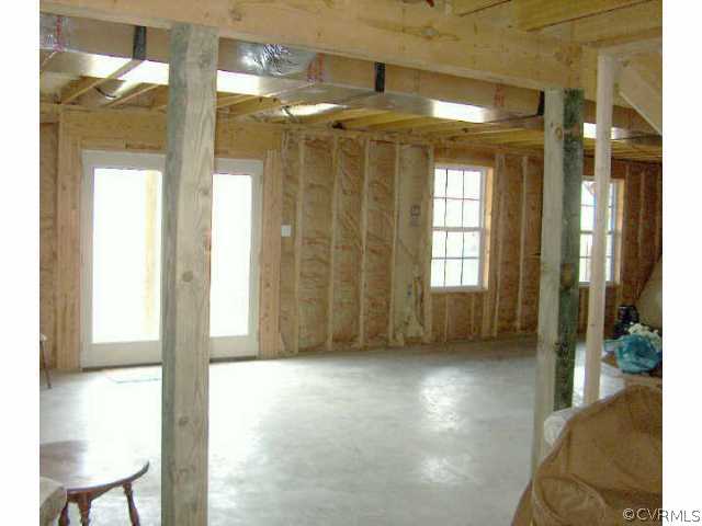 64 Ashburn Road Cumberland, VA 23040 - Photo 4 of 8 a view of empty room with floor to ceiling window
