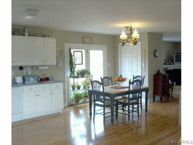 64 Ashburn Road Cumberland, VA 23040 - Photo 6 of 8 a view of a dining room with furniture and wooden floor