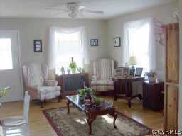 64 Ashburn Road Cumberland, VA 23040 - Photo 7 of 8 a living room with furniture and a window