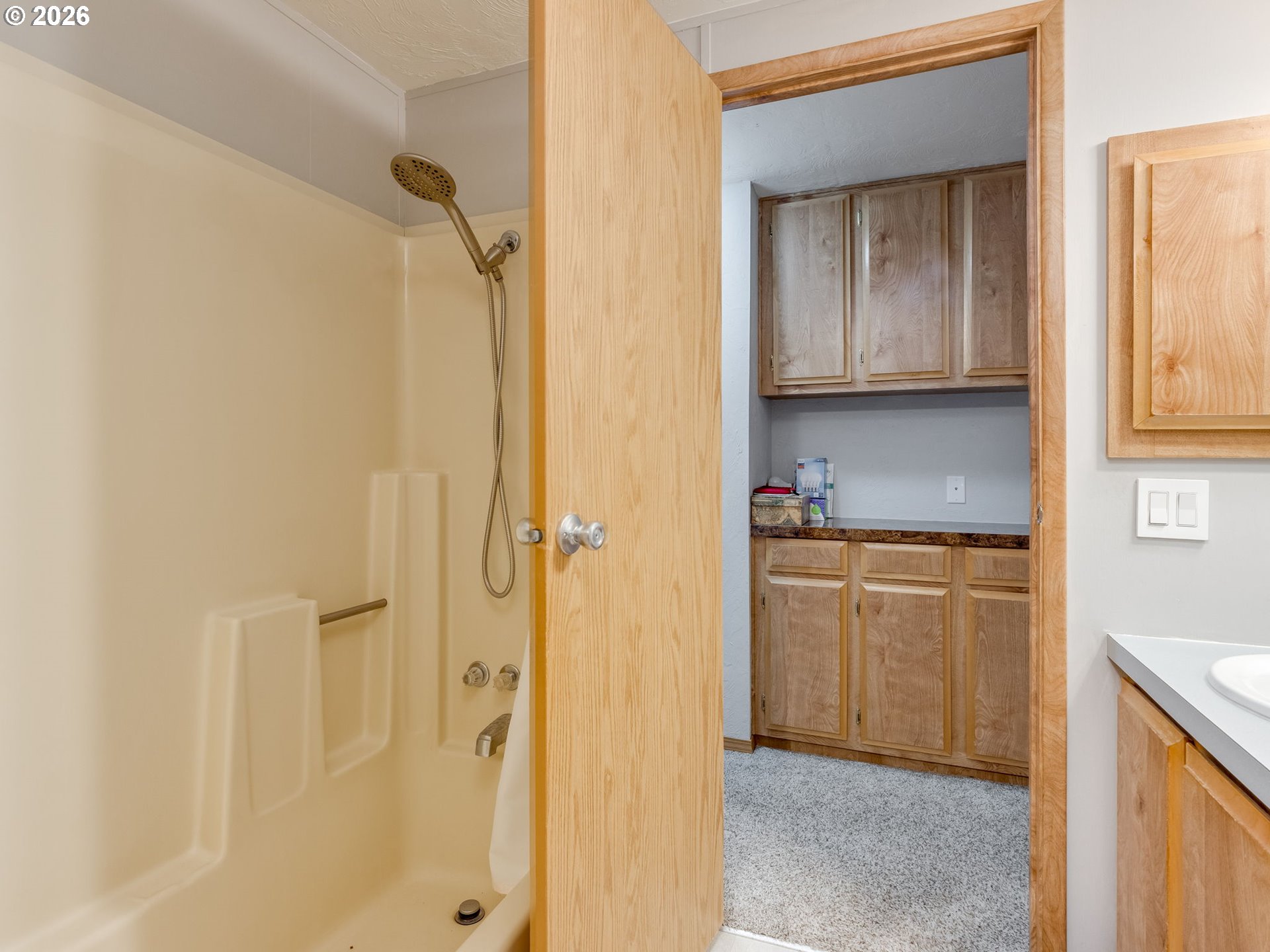 4730 Auburn Road Northeast, Unit 125 Salem, OR 97301 - Photo 15 of 36 a bathroom with a granite countertop sink a vanity and a mirror