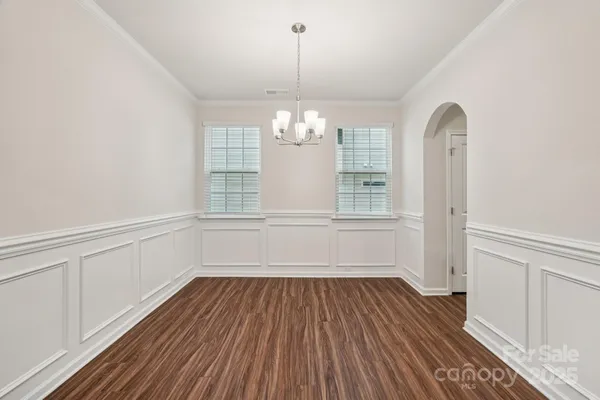 a view of a livingroom with wooden floor