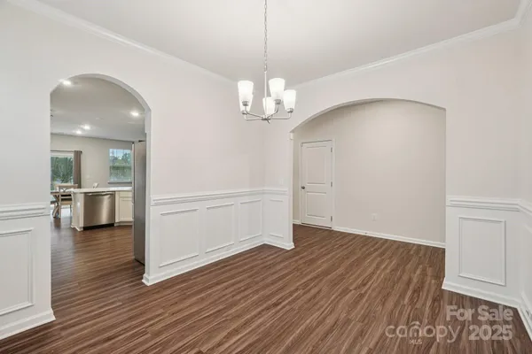 a room with furniture and air hockey table