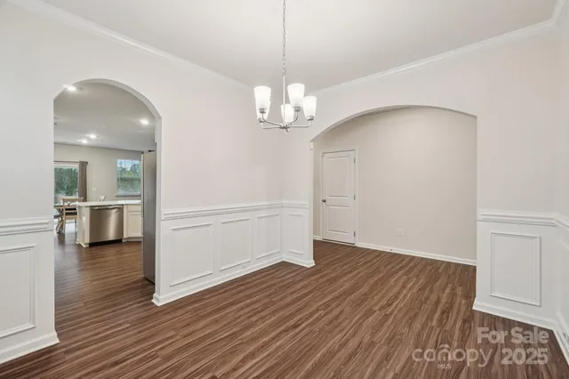a room with furniture and air hockey table