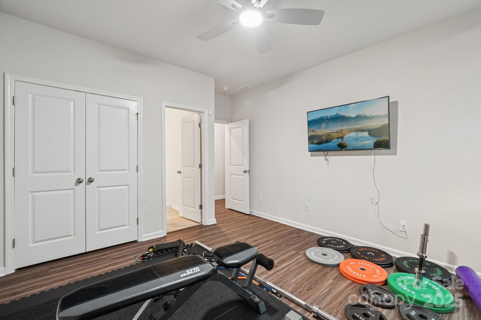 299 Hamptons Cove Road Troutman, NC 28166 - Photo 17 of 40 a room with furniture and air hockey table