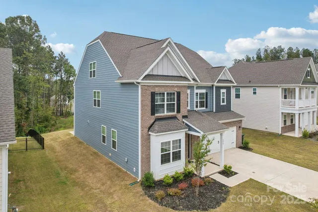 a house view with a garden space