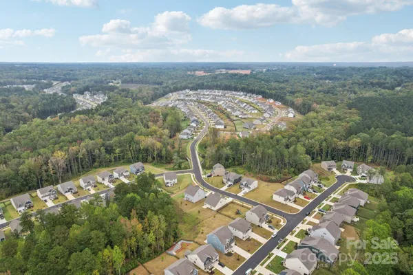 a kitchen with cabinets and outdoor view