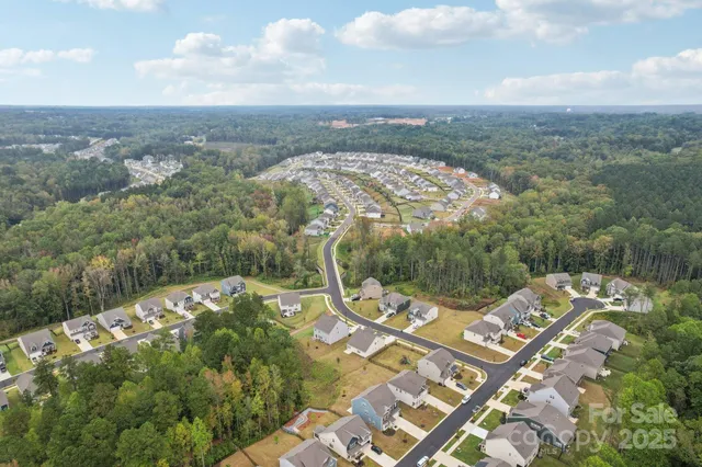 a kitchen with cabinets and outdoor view