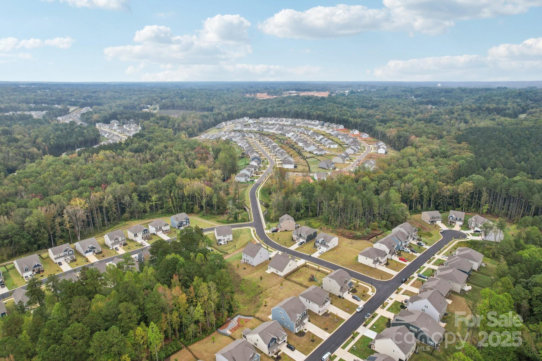 299 Hamptons Cove Road Troutman, NC 28166 - Photo 36 of 40 an aerial view of a city